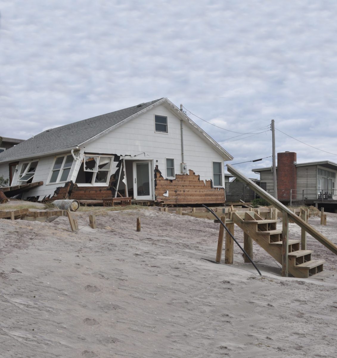 house on beach post storm